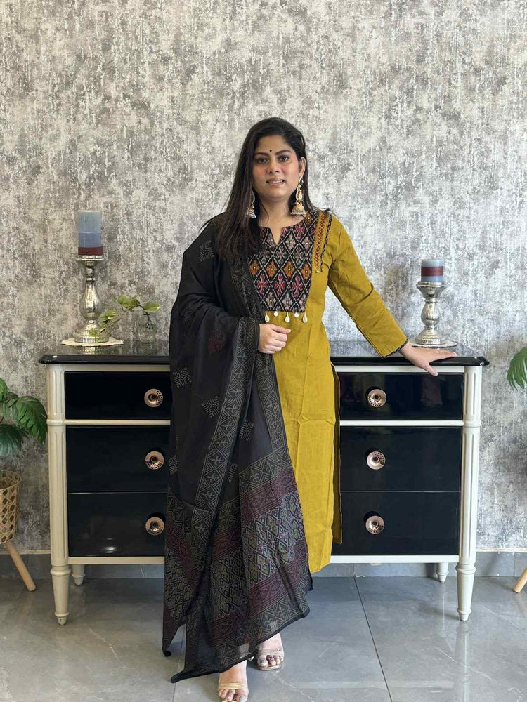 premium-cotton-suit-with-ikkat-patch-work-at-front-back-with-katha-shell-work-paired-with-block-print-mul-cotton-dupatta-mustard-green-1