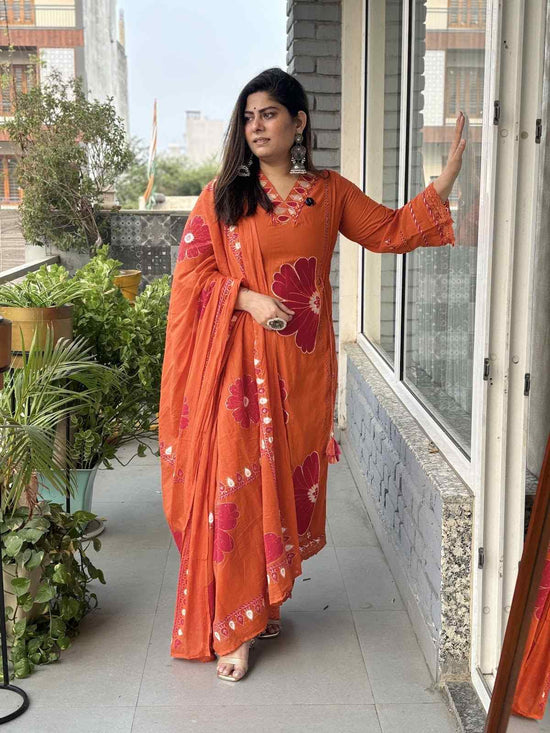 pure-cotton-embroidered-suit-set-with-tassels-on-sides-paired-with-mul-cotton-hand-painted-dupatta-orange-1