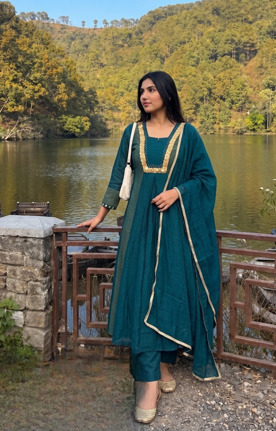 Premium Banaras Mul Chanderi Hand Embroidered A-line Suit Set With Mul Cotton Lining in Emrald Green