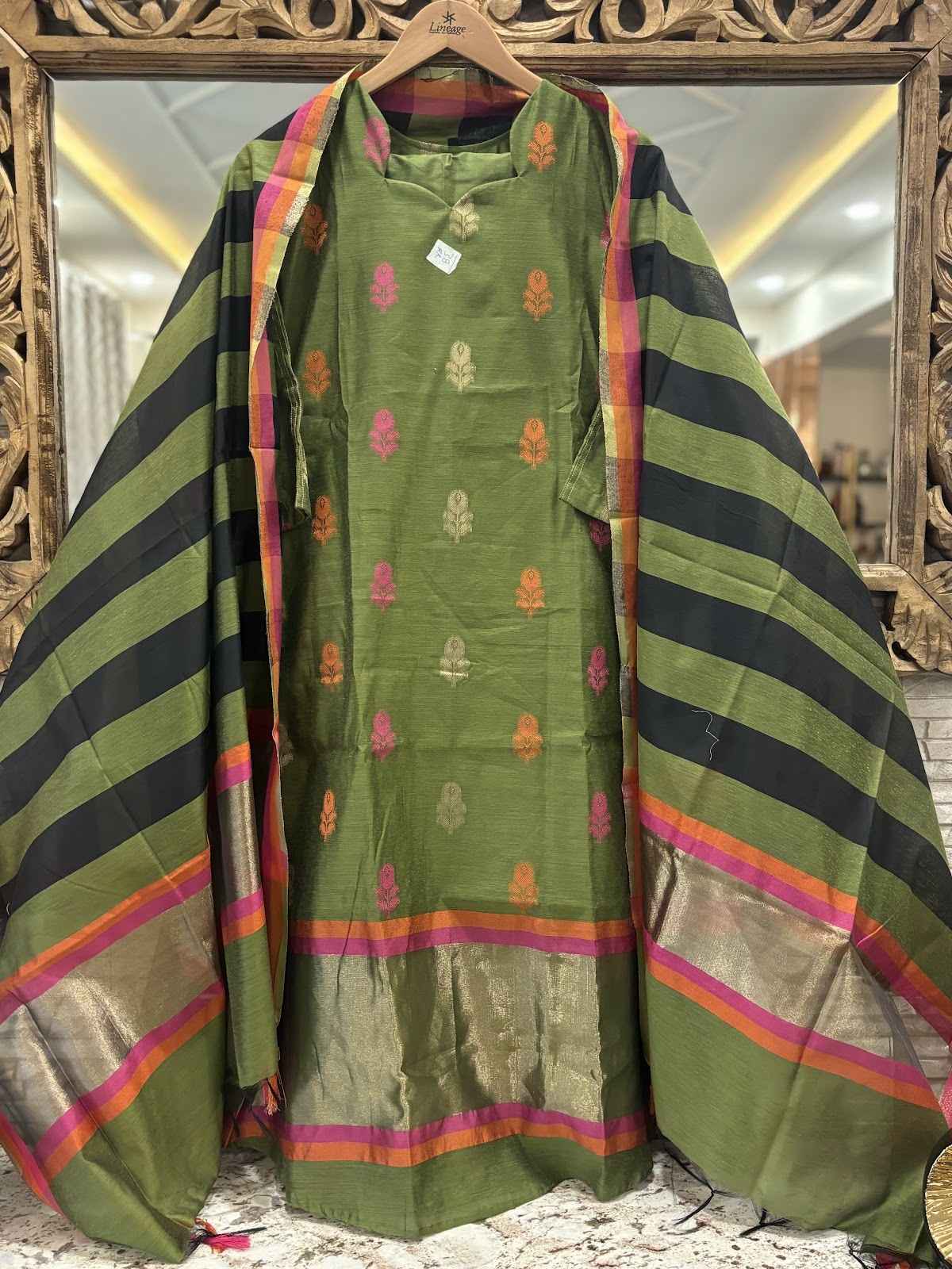 banarsi-silk-jamdani-a-line-suit-set-with-cotton-lining-paired-with-silk-striped-dupatta-megendi-green-1