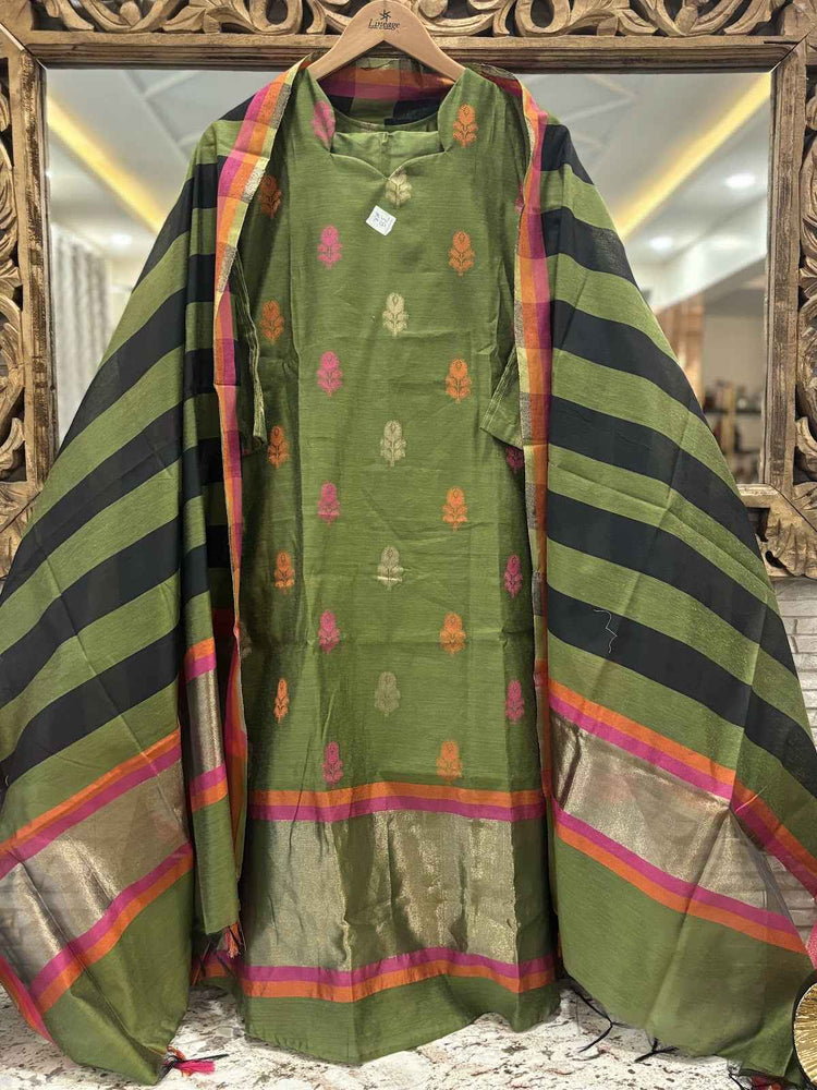 banarsi-silk-jamdani-a-line-suit-set-with-cotton-lining-paired-with-silk-striped-dupatta-megendi-green-1