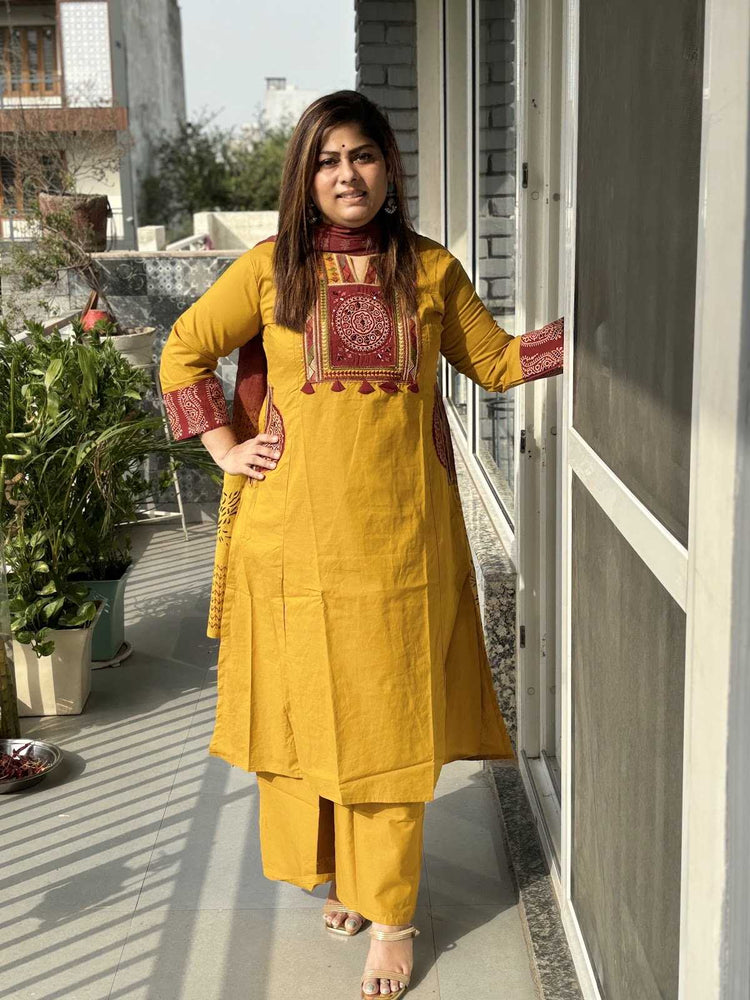 cambric-cotton-embroidered-a-line-suit-set-with-patch-work-at-back-embroidered-pockets-mustard-1