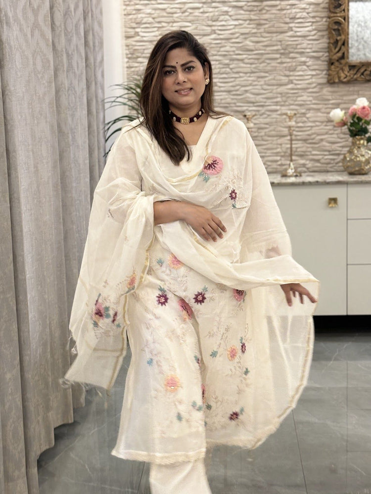 premium-banaras-mul-chanderi-applique-zari-embroidered-a-line-suit-set-paired-with-applique-work-mul-chanderi-dupatta-off-white-and-pink-1