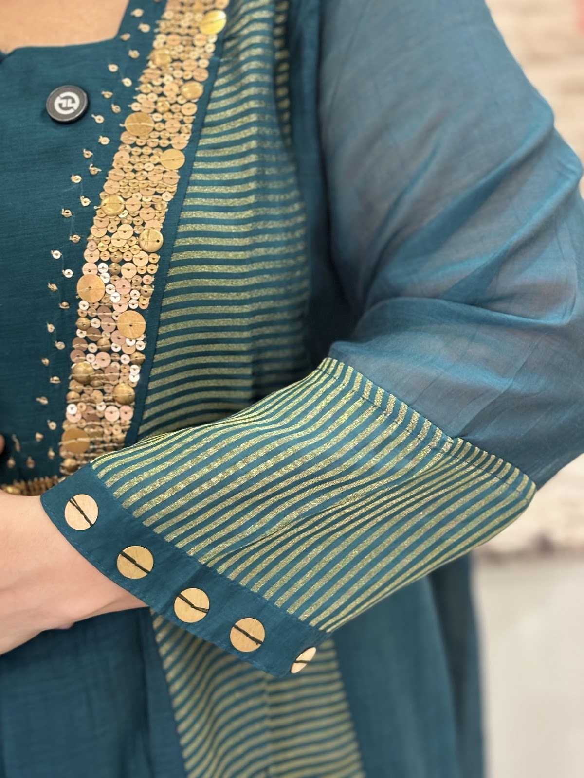 premium-banaras-mul-chanderi-hand-embroidered-a-line-suit-set-with-mul-cotton-lining-emrald-green-3
