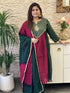 premium-banaras-mul-chanderi-hand-embroidered-suit-set-with-gathers-mul-cotton-lining-paired-with-organza-tie-dye-dupatta-bottle-green-and-rani-1