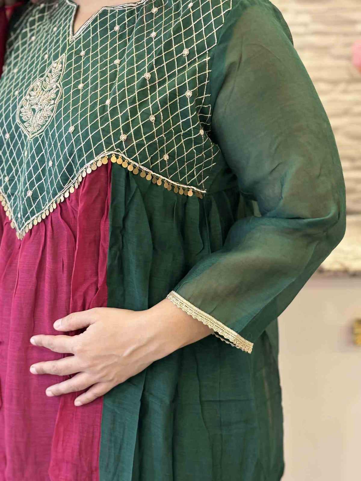 premium-banaras-mul-chanderi-hand-embroidered-suit-set-with-gathers-mul-cotton-lining-paired-with-organza-tie-dye-dupatta-bottle-green-and-rani-3