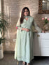 pure-banaras-mul-chanderi-anarkali-with-embroidered-sleeves-and-back-pista-green-1